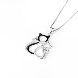 Seven Season Cutie Cat Enhanced Black and White Double Cat Pendant Necklace