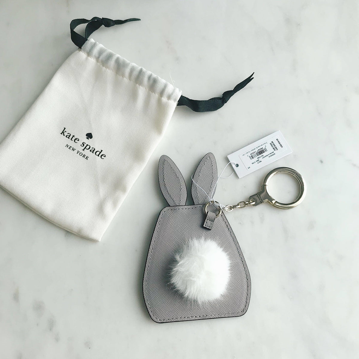 Kate spade outlet pouf keychain