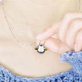 Seven Season Angel Egg with Wings Pendant Necklace