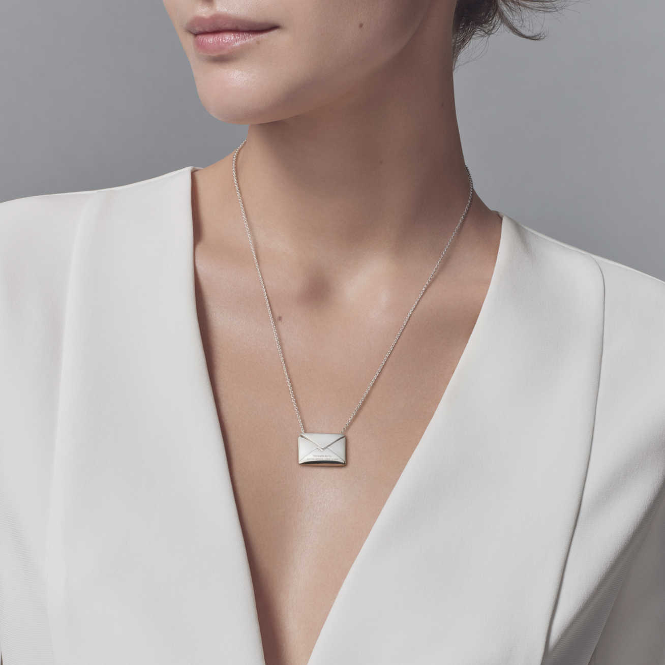 Tiffany and co envelope necklace on sale