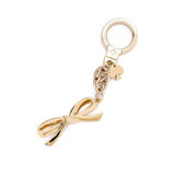 kate spade new york Finishing Touch Bow Keychain-Seven Season